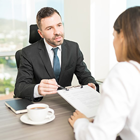 A Man Explaining Something to a Woman