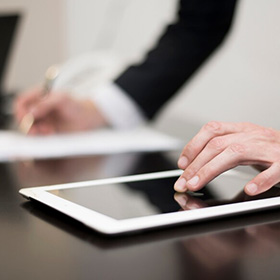 A Person Using a Tablet